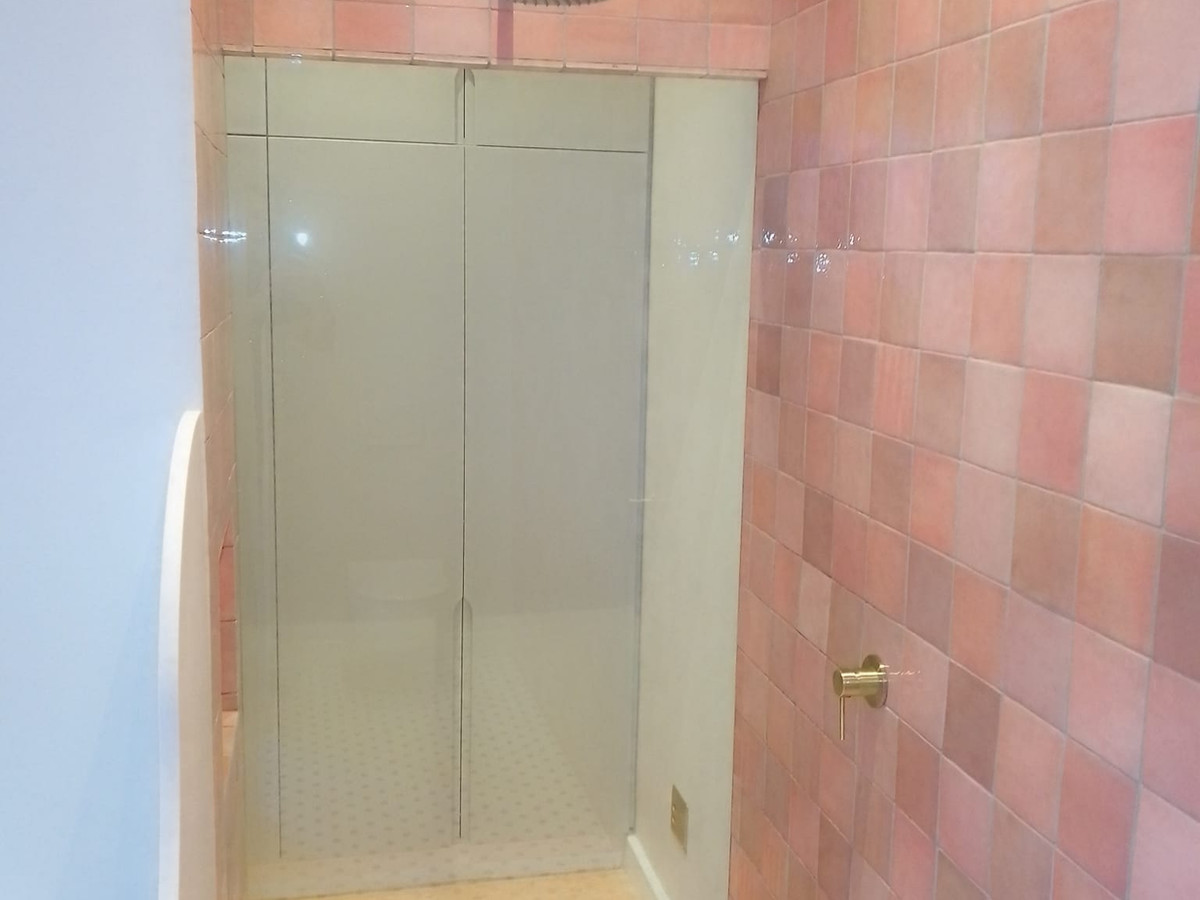 Shower enclosure installation